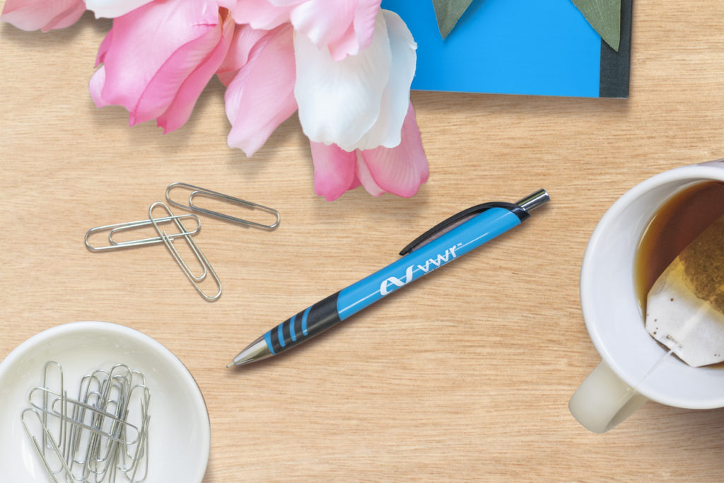 Meemo Wild blue promotional pen on a desk